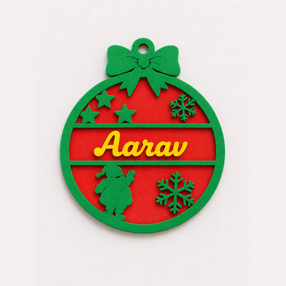 Green and red personalised Christmas bauble example with a name
